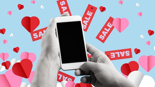Photo st valentine's day sale creative trend abstract template collage of man's hand hearts mobile phone